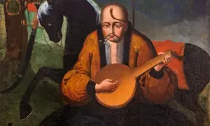 Kozak z fajką i kobzą siedzi na czarnym koniu.