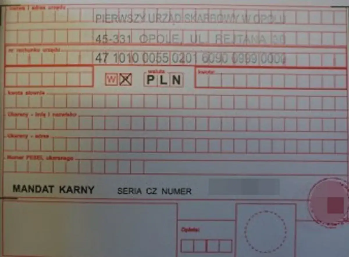 Formularz mandatu karnego z danymi urzędu skarbowego i numerem rachunku.